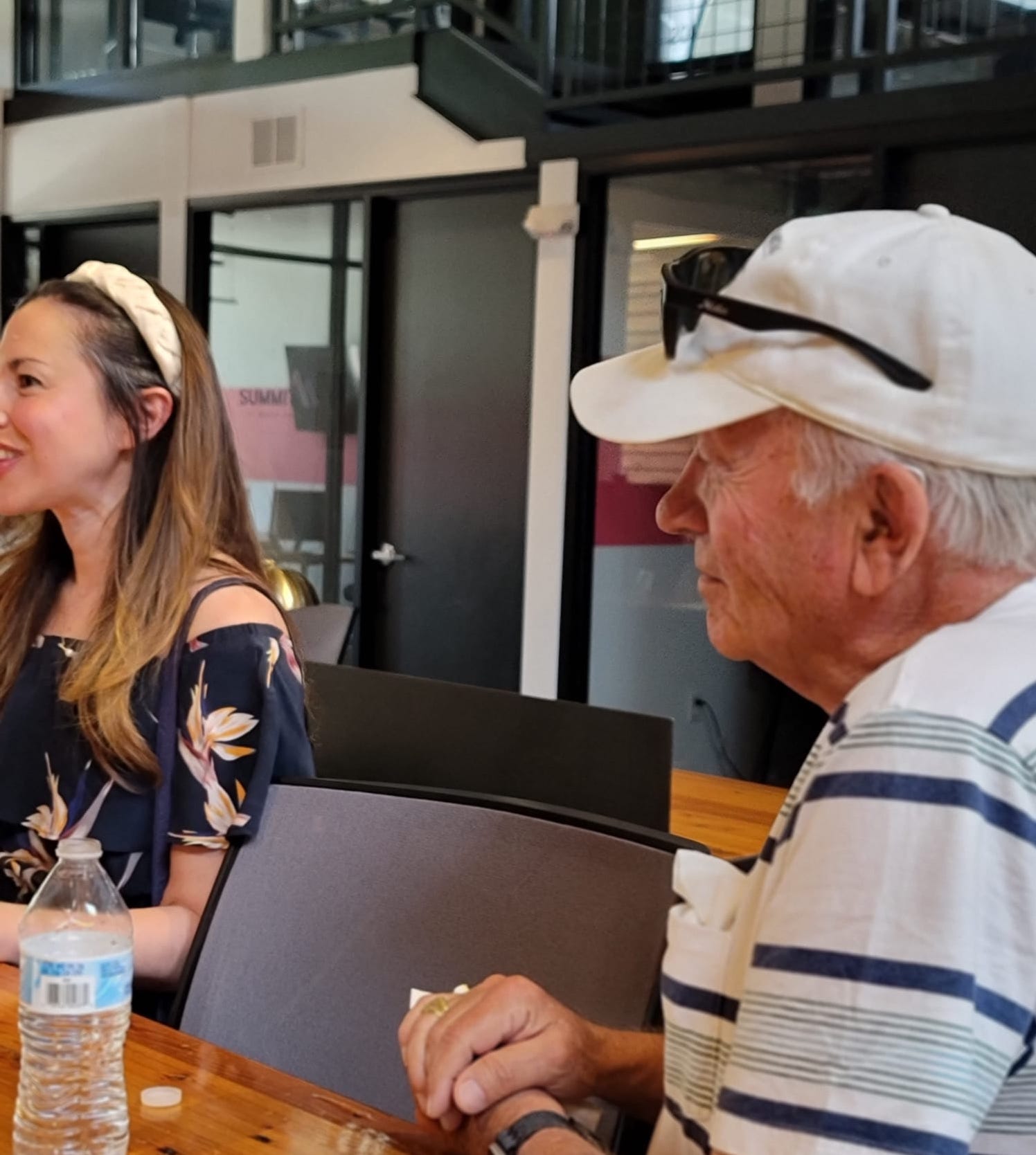 Celebrating wins event - community members sharing a meal